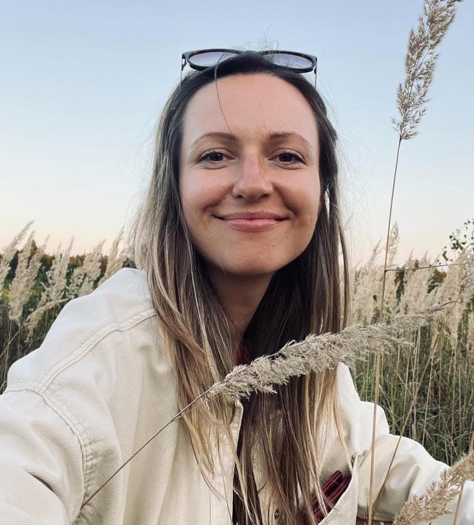 Professional portrait of a warm and approachable woman